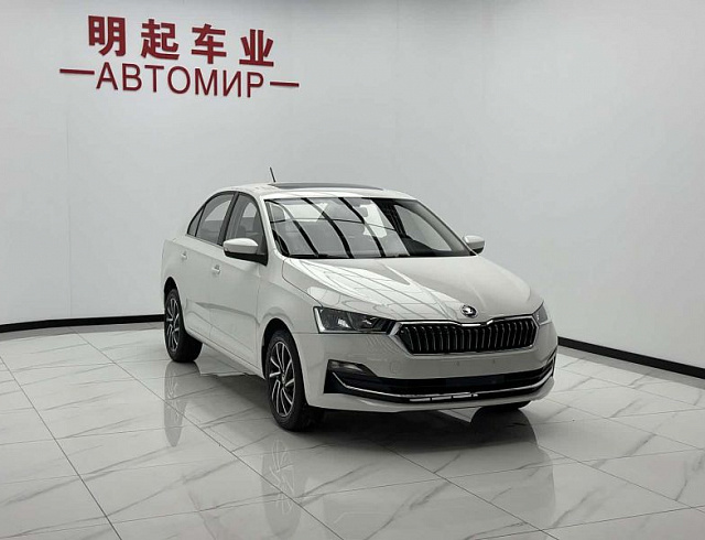 Skoda Rapid 1.5 л 2023 г. Белый, пробег 26000 км