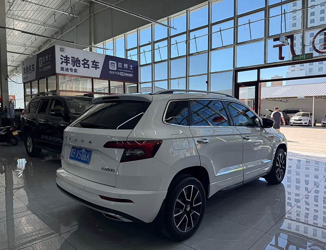 Skoda Karoq 1.4 л 2023 г. Белый, пробег 27000 км