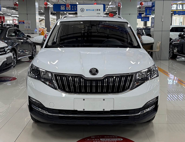 Skoda Kamiq 1.5 л 2023 г. Белый, пробег 28000 км