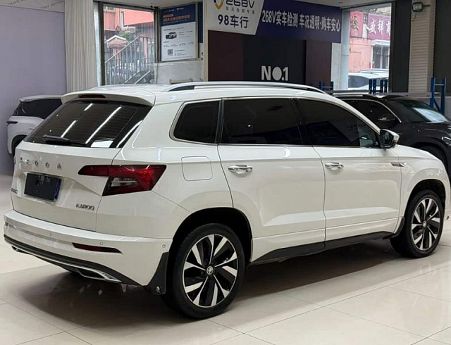 Skoda Karoq 1.4 л 2023 г. Белый, пробег 26000 км