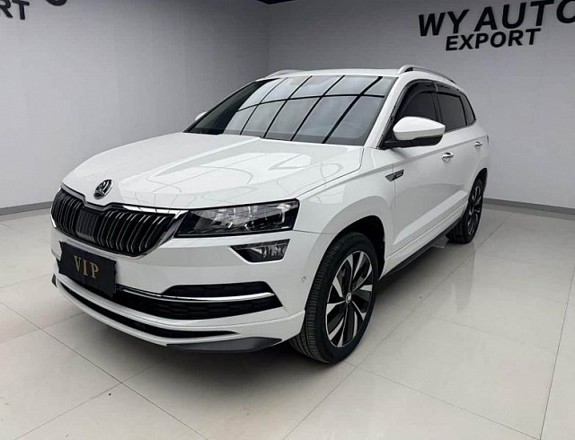 Skoda Karoq 1.4 л 2023 г. Белый, пробег 12000 км