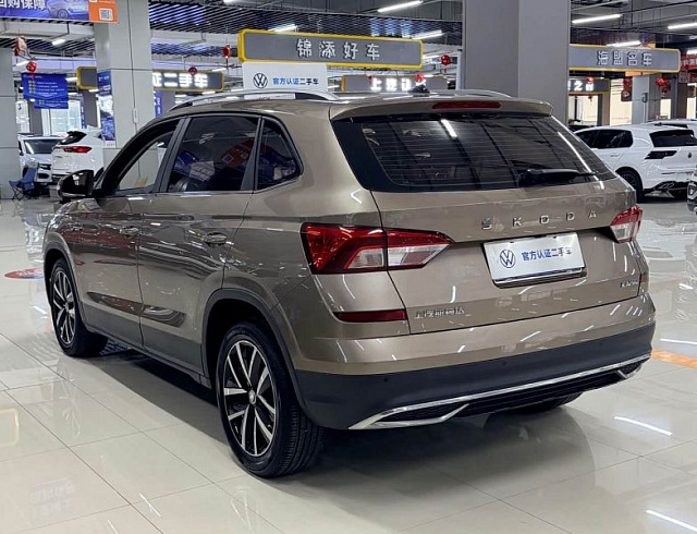 Skoda Kamiq 1.5 л 2023 г. шампань/коричневый, пробег 31000 км