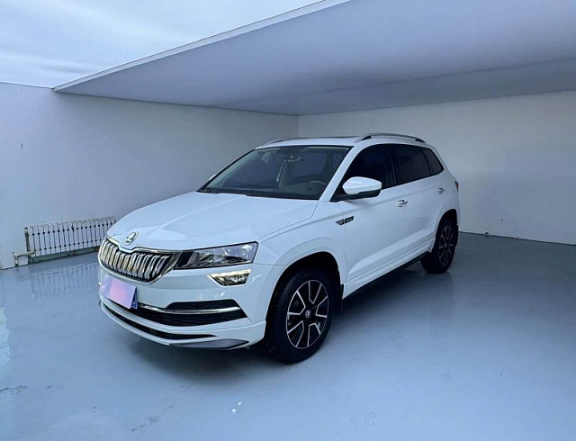 Skoda Karoq 1.4 л 2023 г. Белый, пробег 33000 км