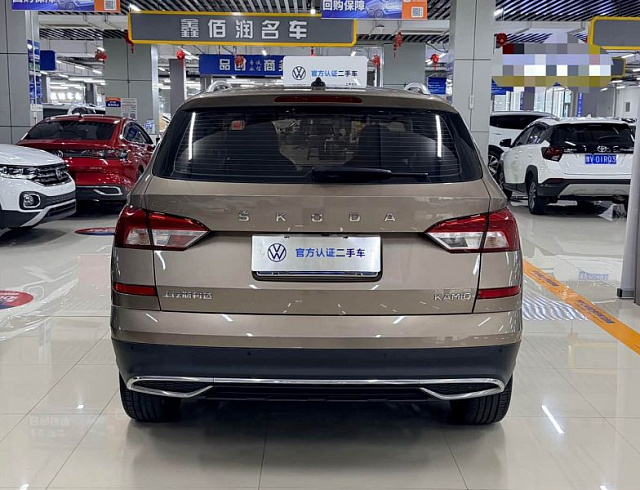 Skoda Kamiq 1.5 л 2023 г. шампань/коричневый, пробег 31000 км