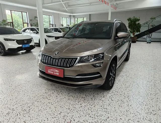 Skoda Karoq 1.4 л 2023 г. шампань/коричневый, пробег 17000 км
