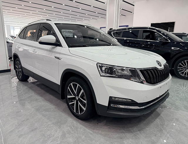 Skoda Kamiq 1.5 л 2023 г. Белый, пробег 15000 км