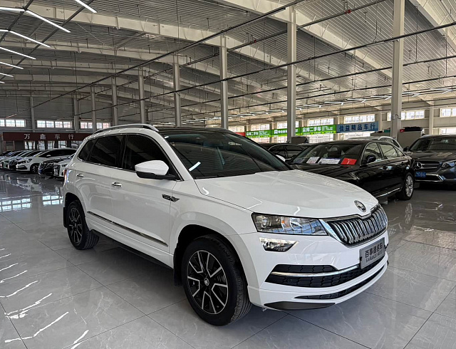 Skoda Karoq 1.4 л 2023 г. Белый, пробег 27000 км