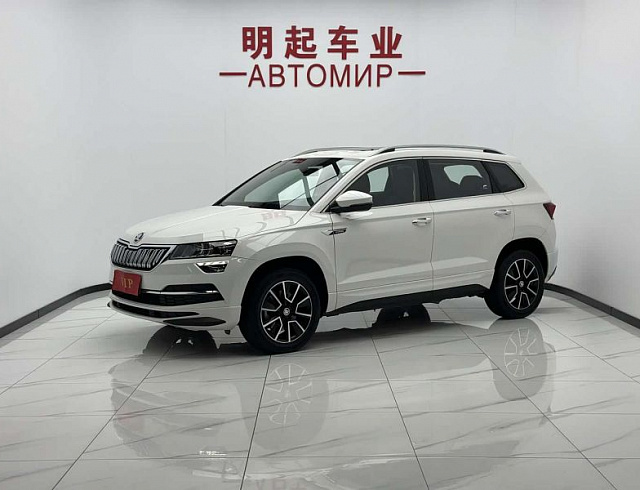 Skoda Karoq 1.4 л 2023 г. Белый, пробег 15000 км