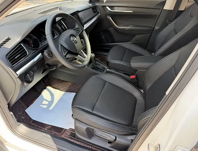 Skoda Kamiq 1.5 л 2023 г. Белый, пробег 33000 км