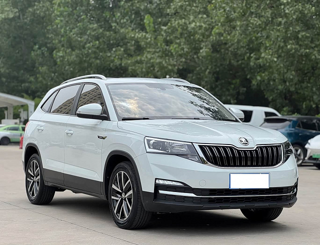 Skoda Kamiq 1.5 л 2023 г. Белый, пробег 18000 км